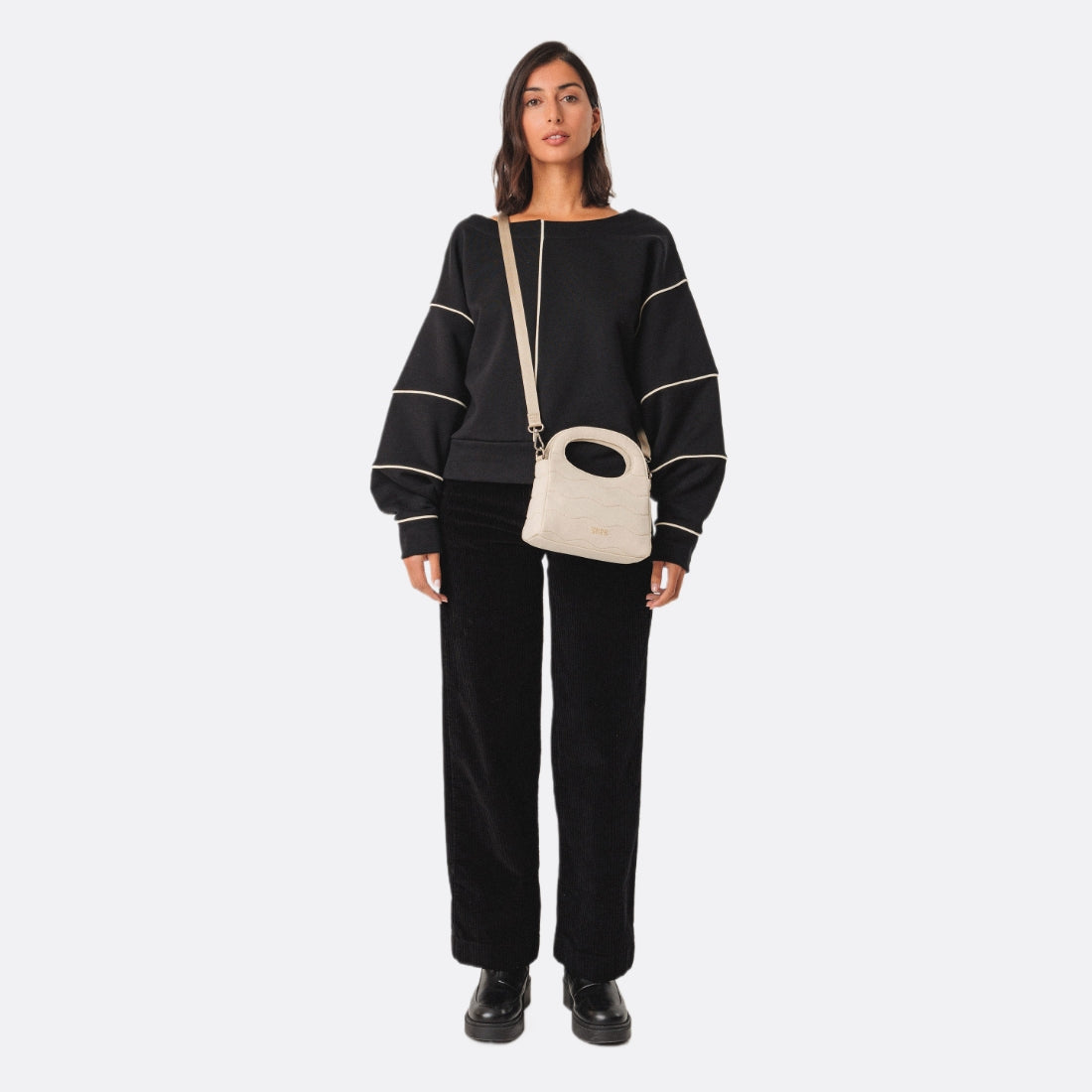 <PRODUCTTITLE> in Black by SKFK.