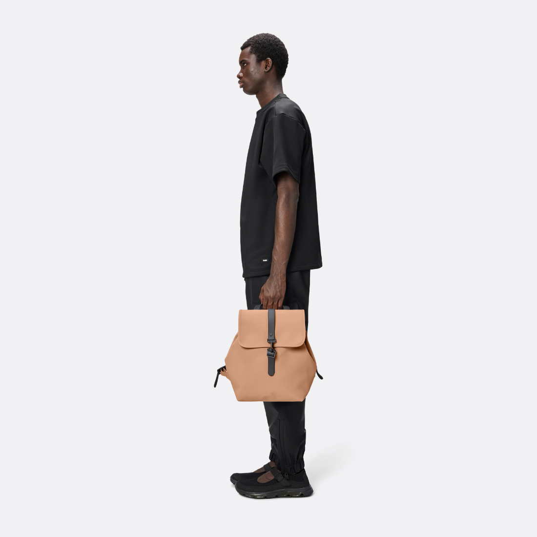 <PRODUCTTITLE> in Orange by Rains.
