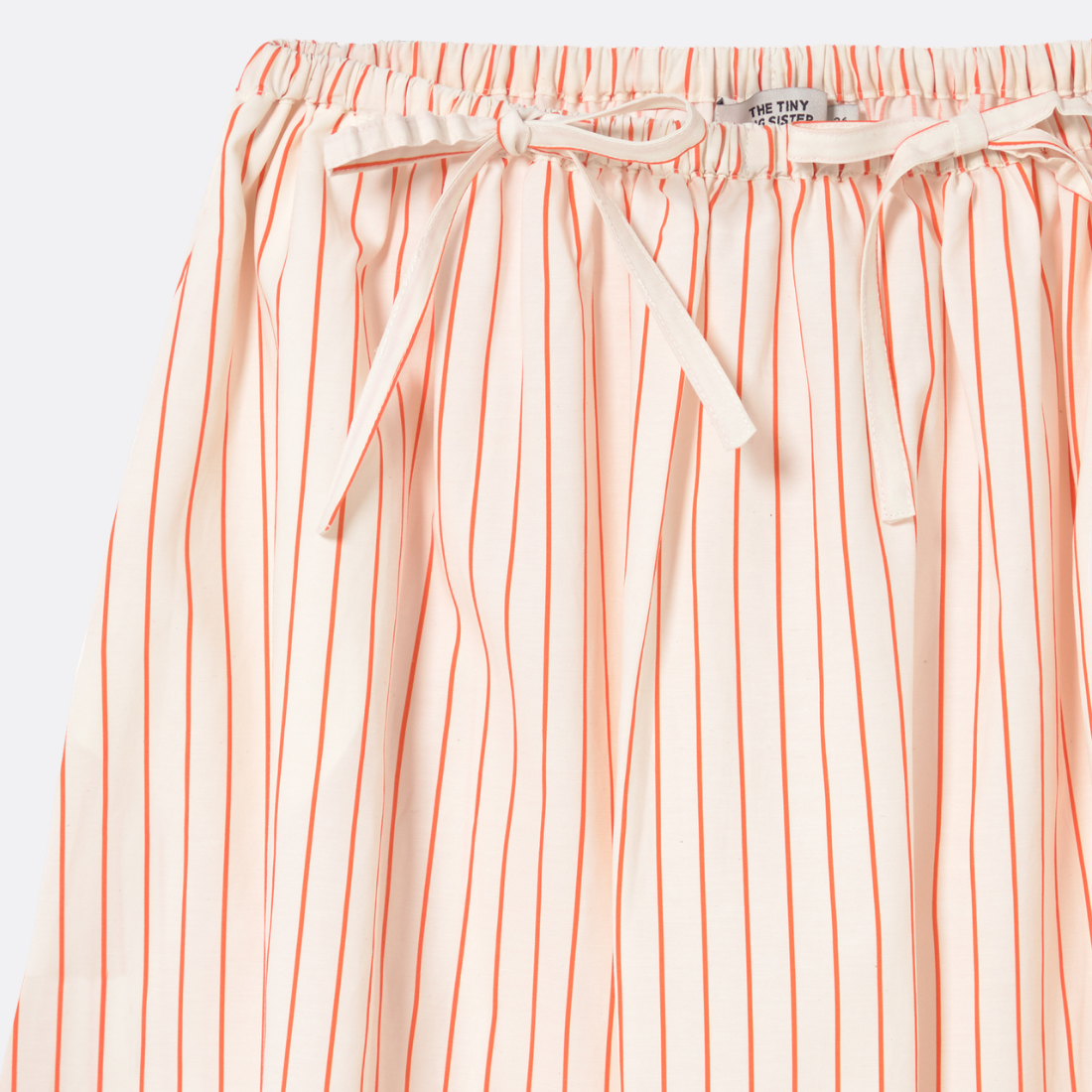 <PRODUCTTITLE> in Orange by Tiny Big Sister.