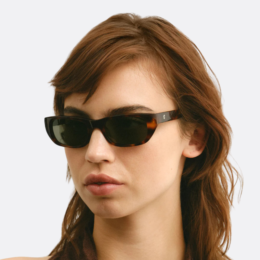 <PRODUCTTITLE> in Brown by Corlin Eyewear.