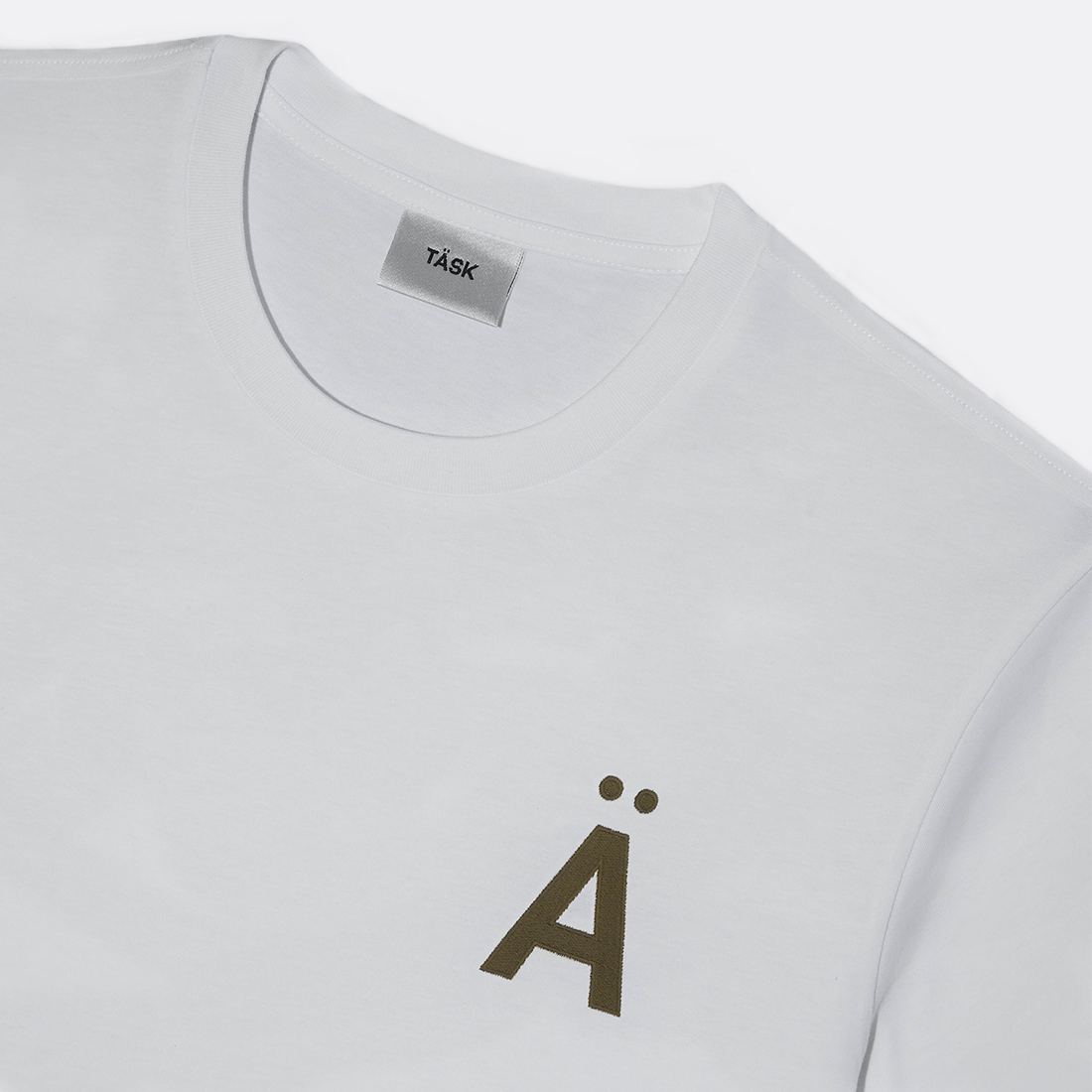 <PRODUCTTITLE> in White by TASK.