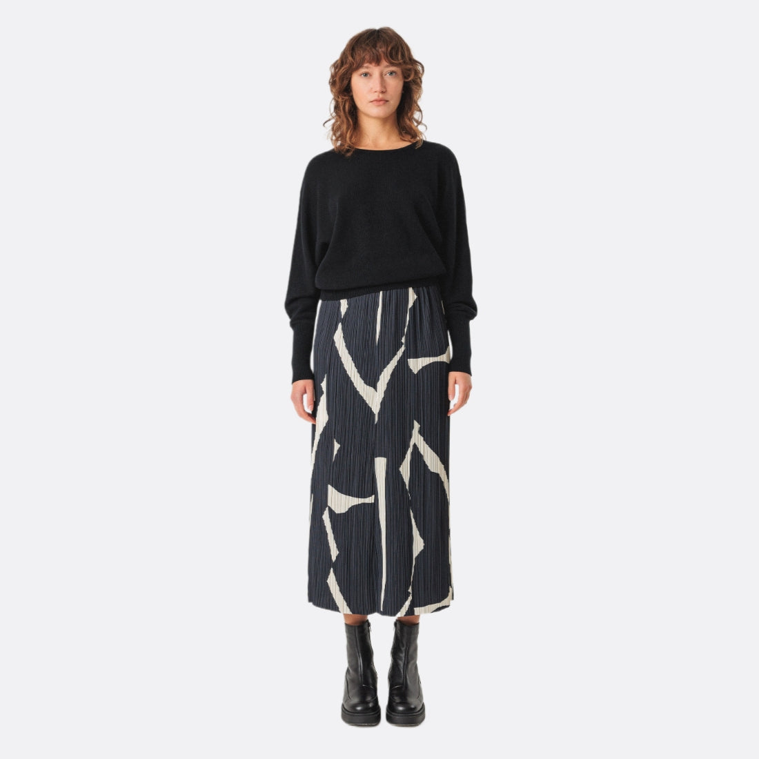 <PRODUCTTITLE> in Black by SKFK.