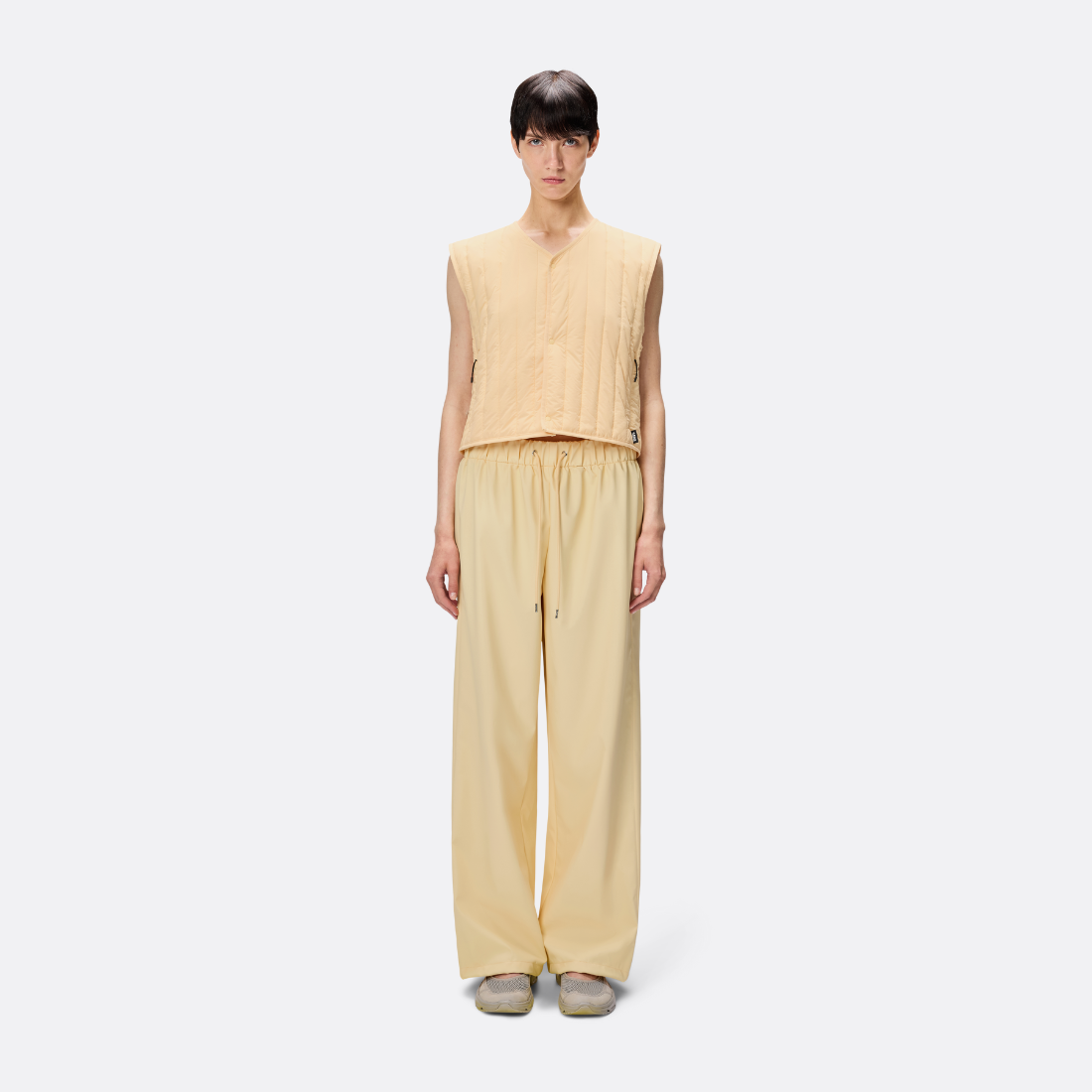 <PRODUCTTITLE> in Yellow by Rains.