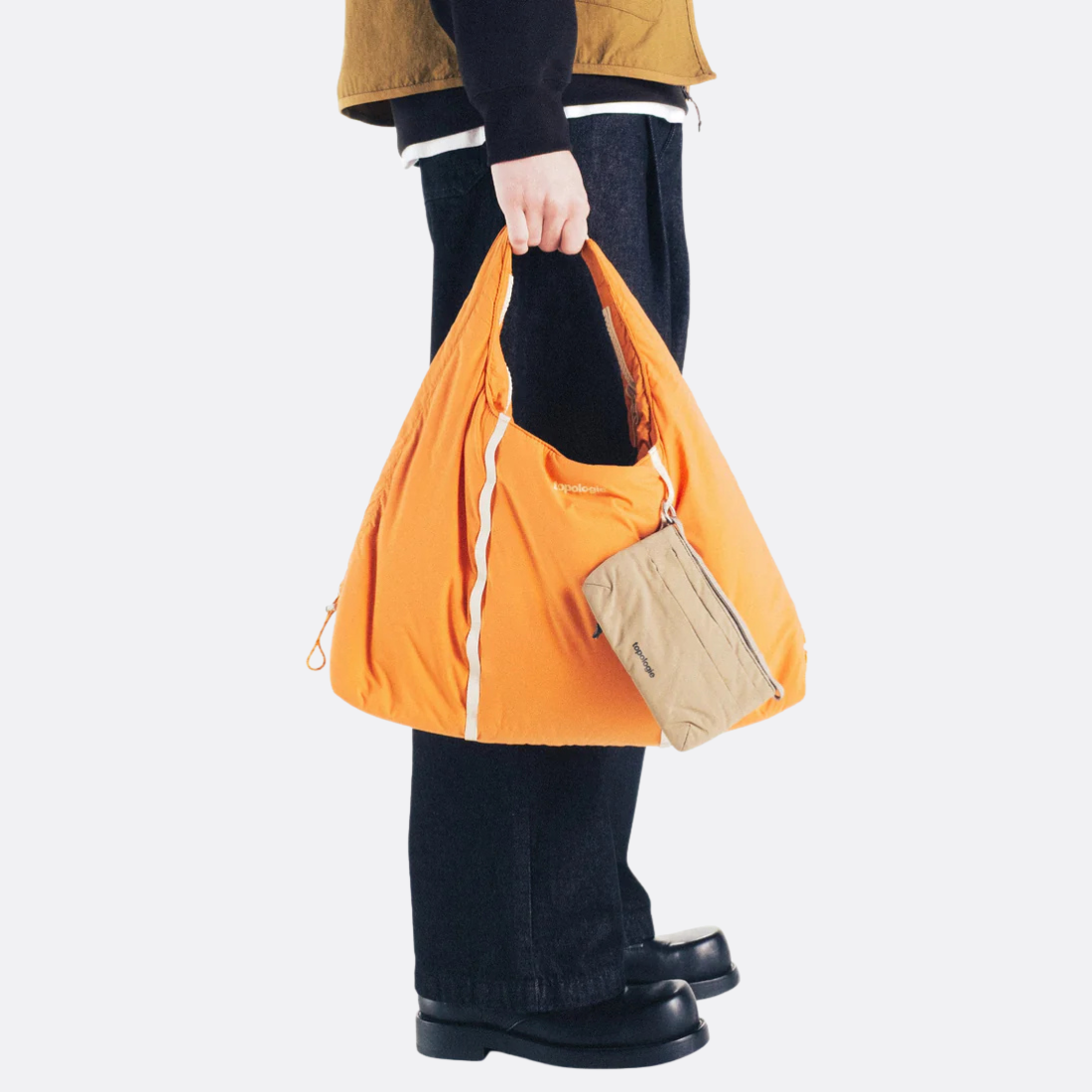 <PRODUCTTITLE> in Orange by Topologie.