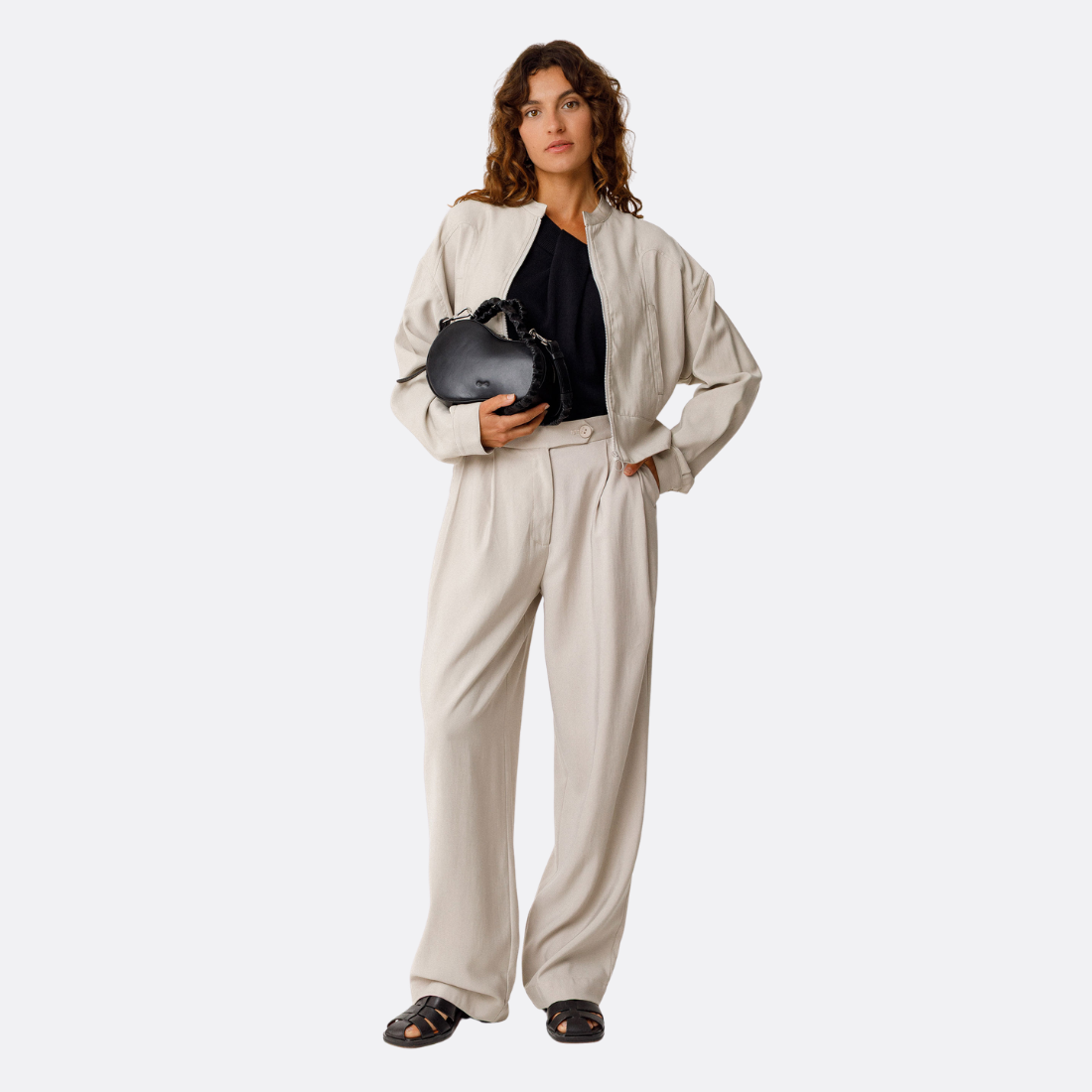 <PRODUCTTITLE> in Black by SKFK.