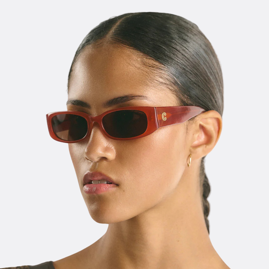 <PRODUCTTITLE> in Red by Corlin Eyewear.