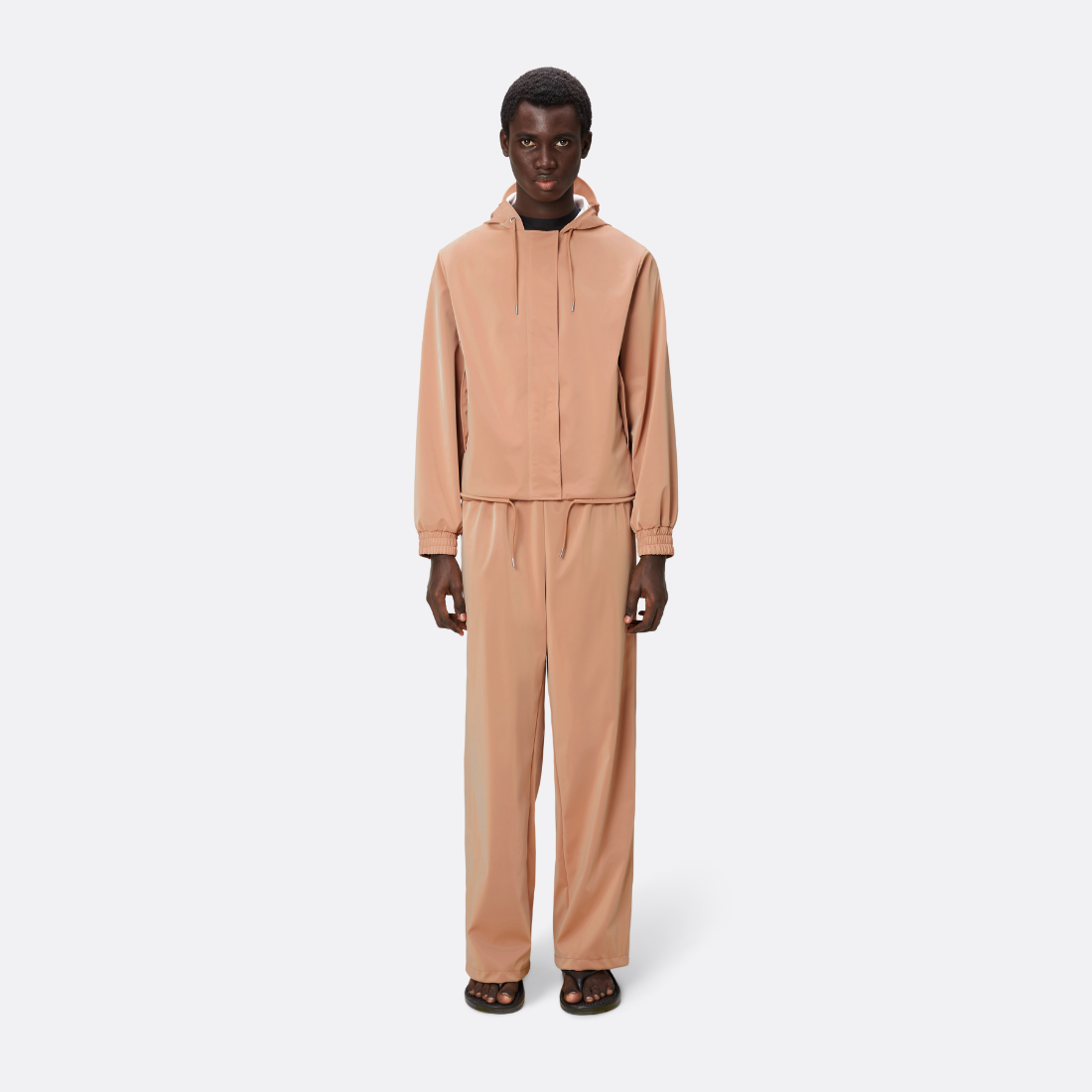 <PRODUCTTITLE> in Orange by Rains.