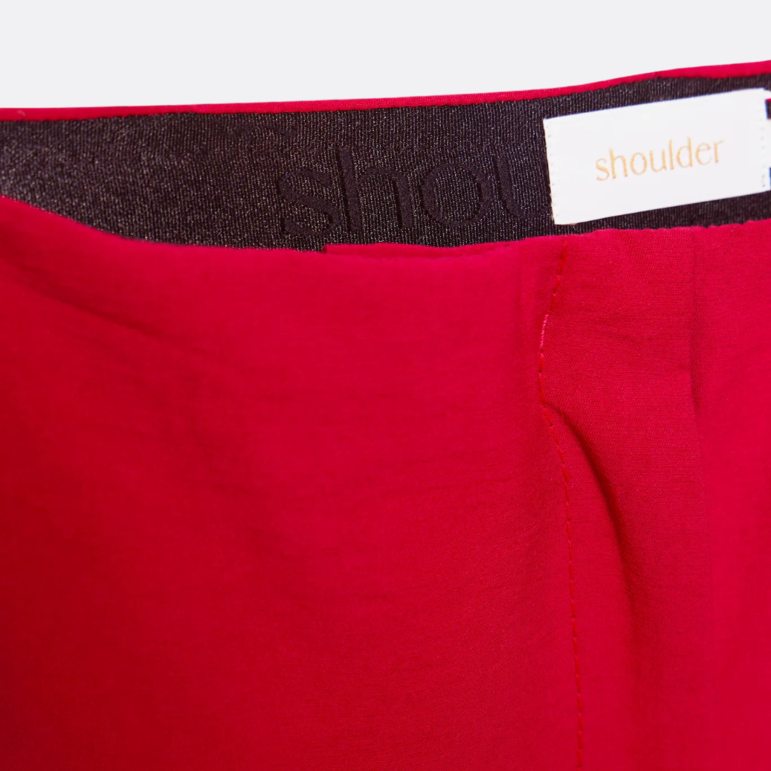<PRODUCTTITLE> in Red by Shoulder.