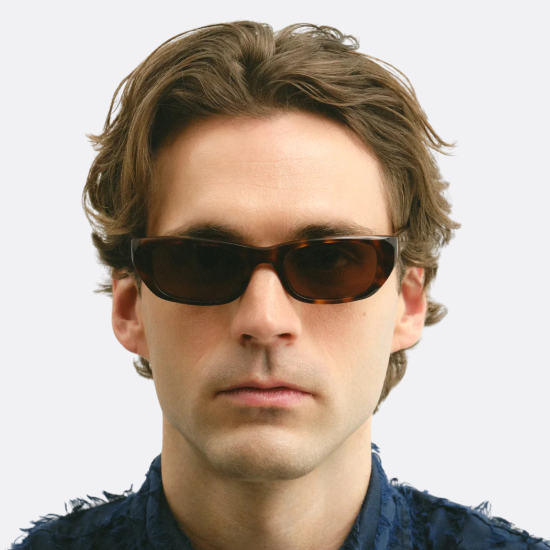 <PRODUCTTITLE> in Brown by Corlin Eyewear.