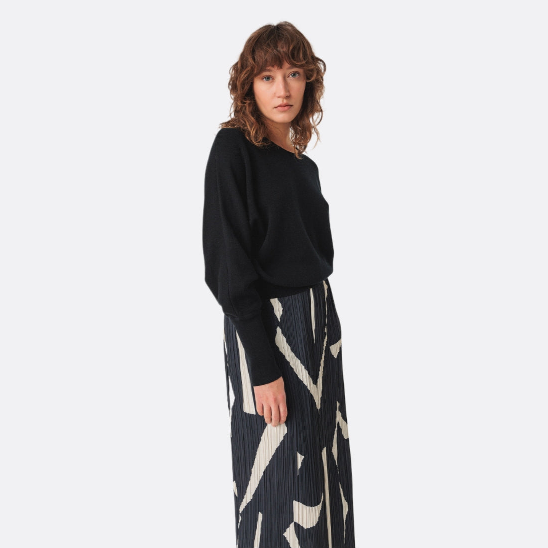 <PRODUCTTITLE> in Black by SKFK.