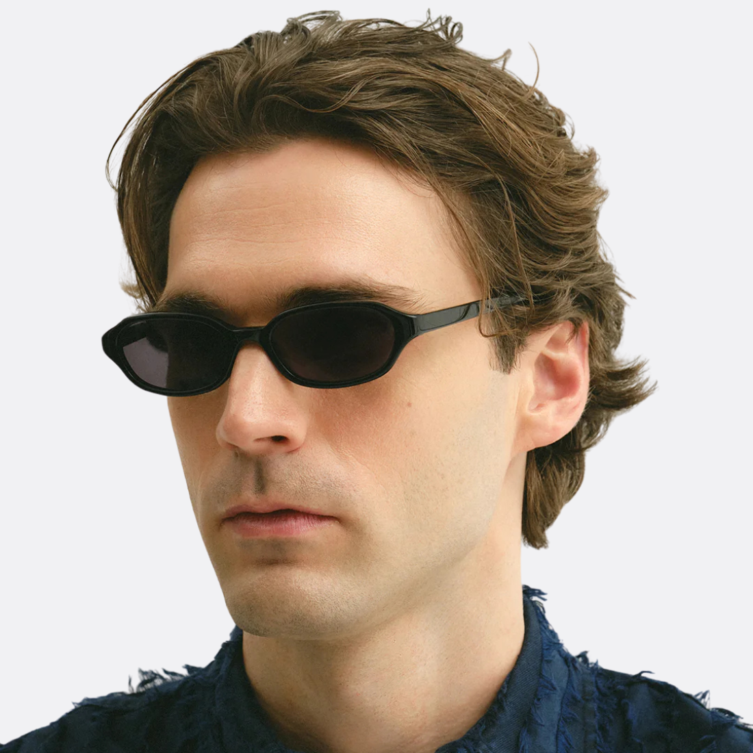 <PRODUCTTITLE> in Black by Corlin Eyewear.