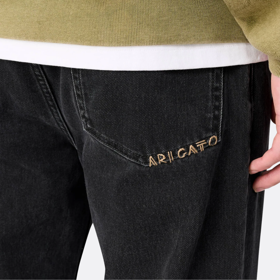 <PRODUCTTITLE> in Black by Axel Arigato.