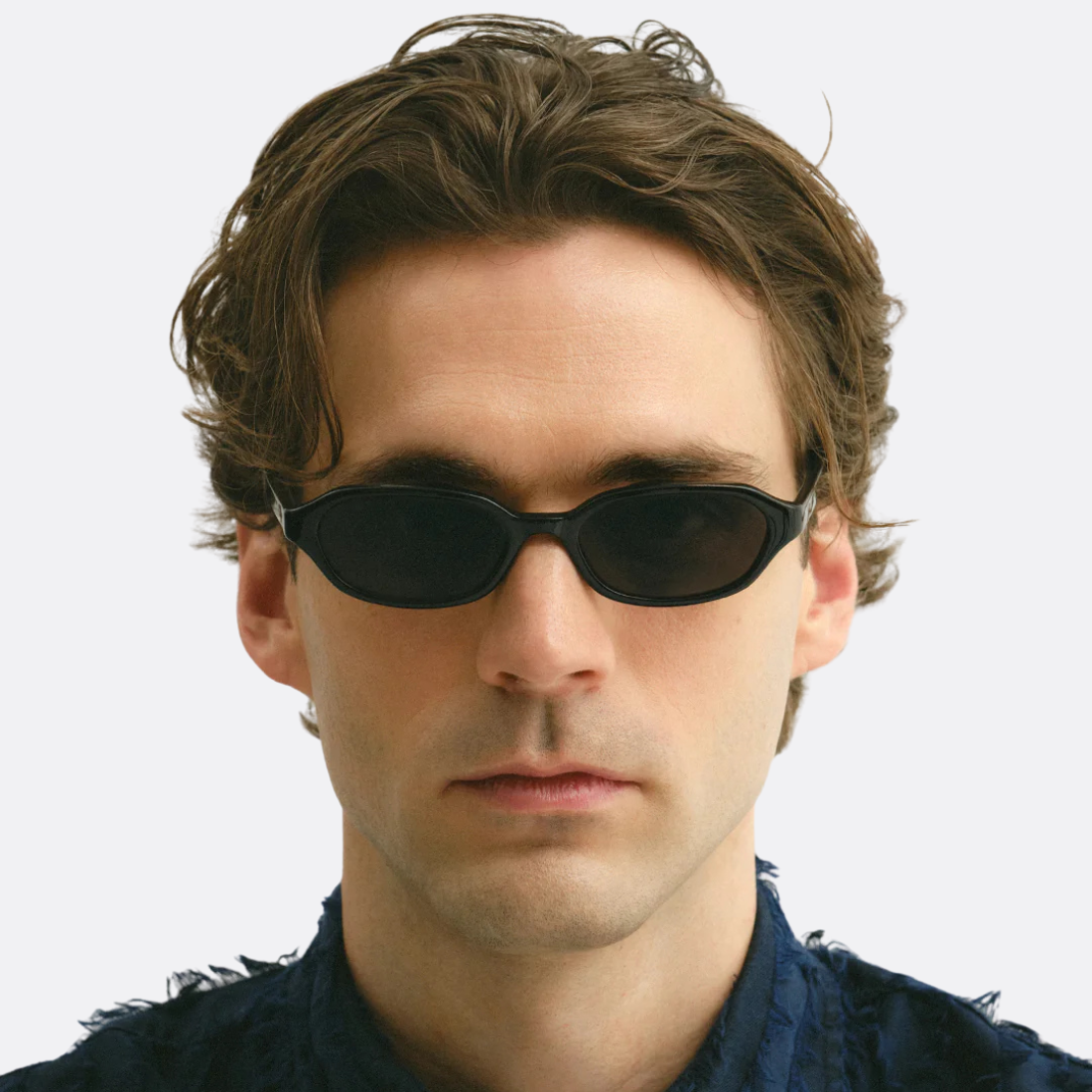 <PRODUCTTITLE> in Black by Corlin Eyewear.