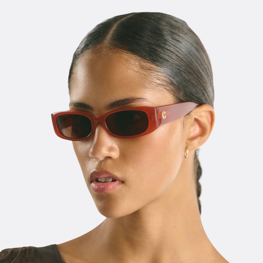 <PRODUCTTITLE> in Red by Corlin Eyewear.