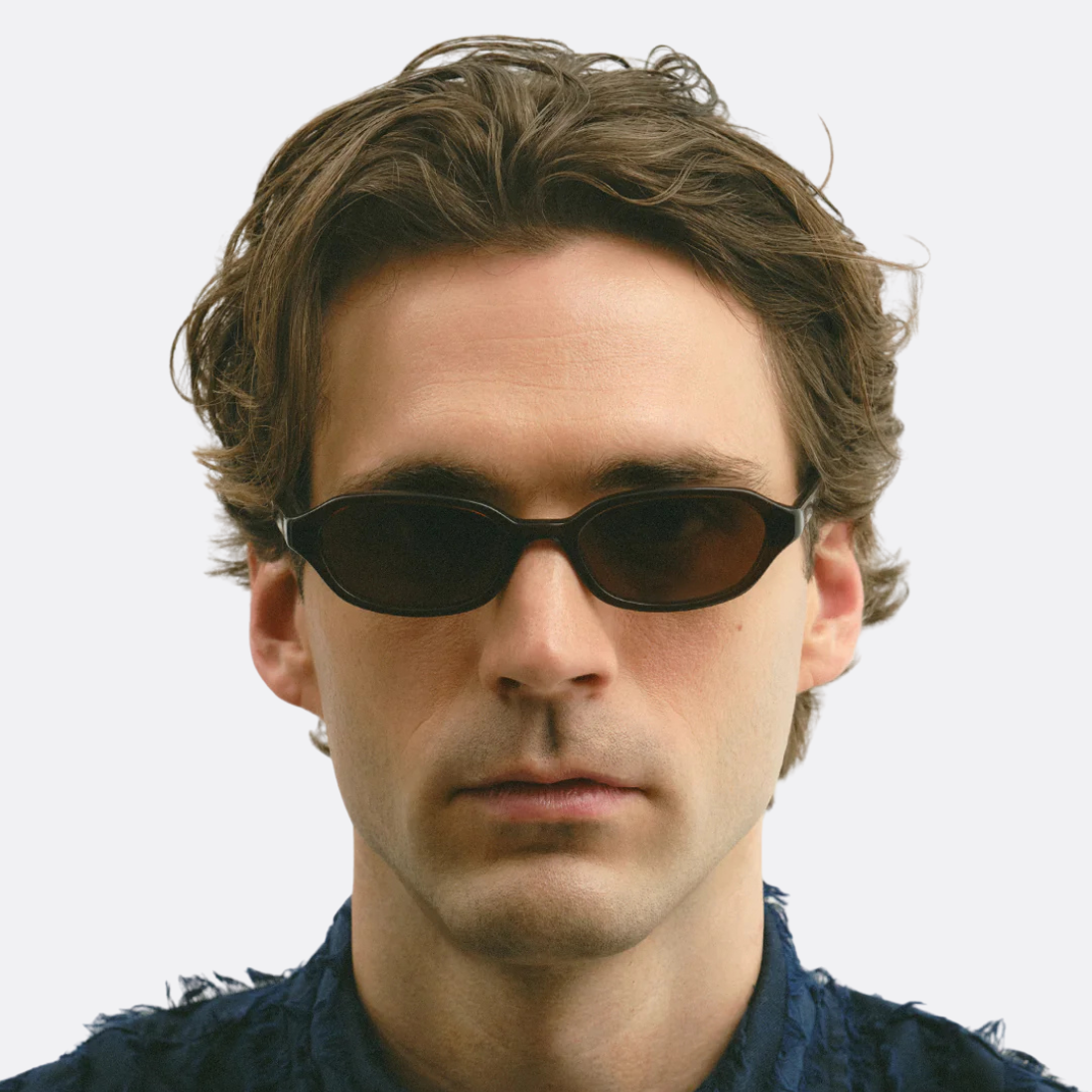 <PRODUCTTITLE> in Brown by Corlin Eyewear.