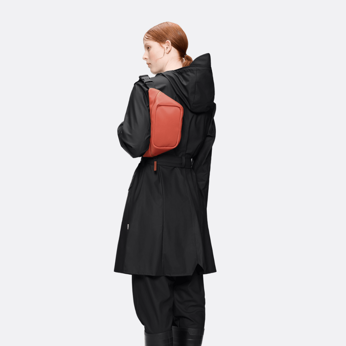 <PRODUCTTITLE> in Orange by Rains.