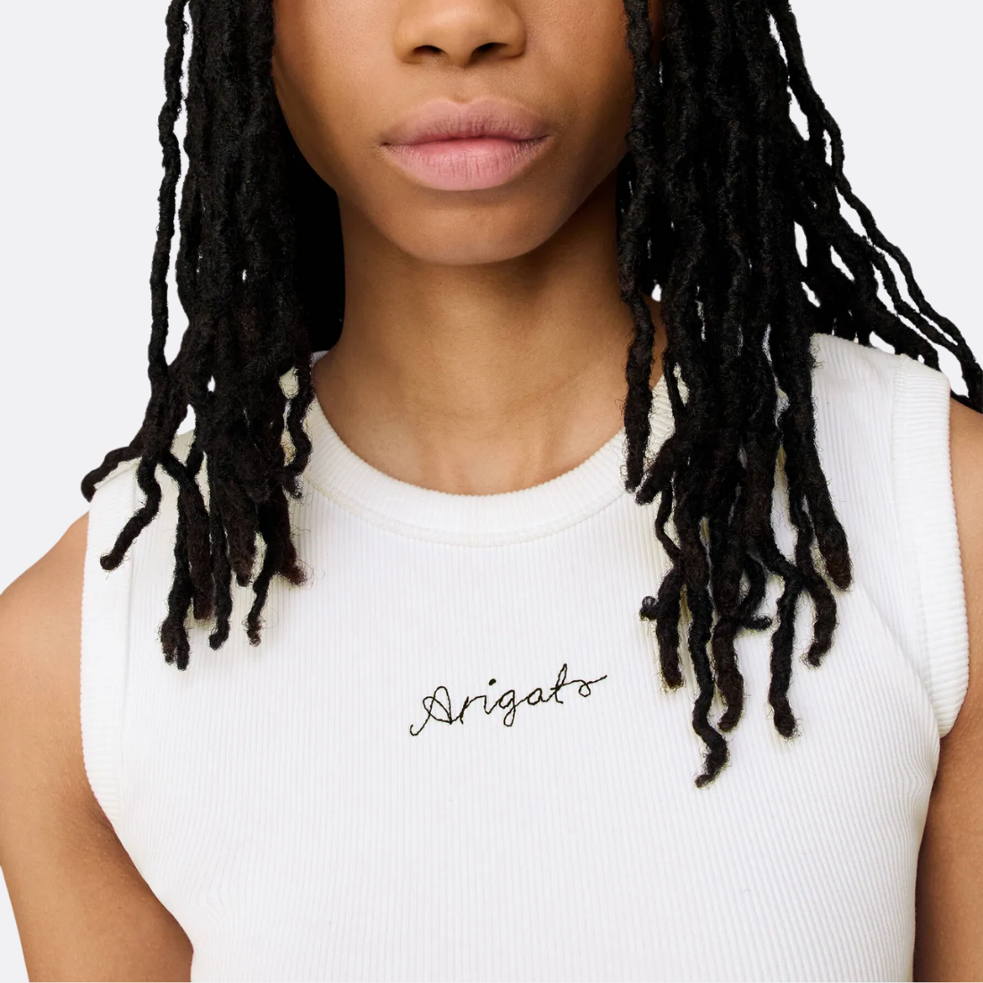 <PRODUCTTITLE> in White by Axel Arigato.