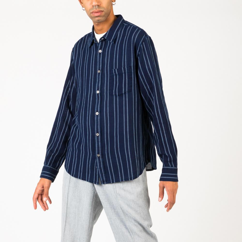 Pajama effect shirt in overdyed indigo cotton.