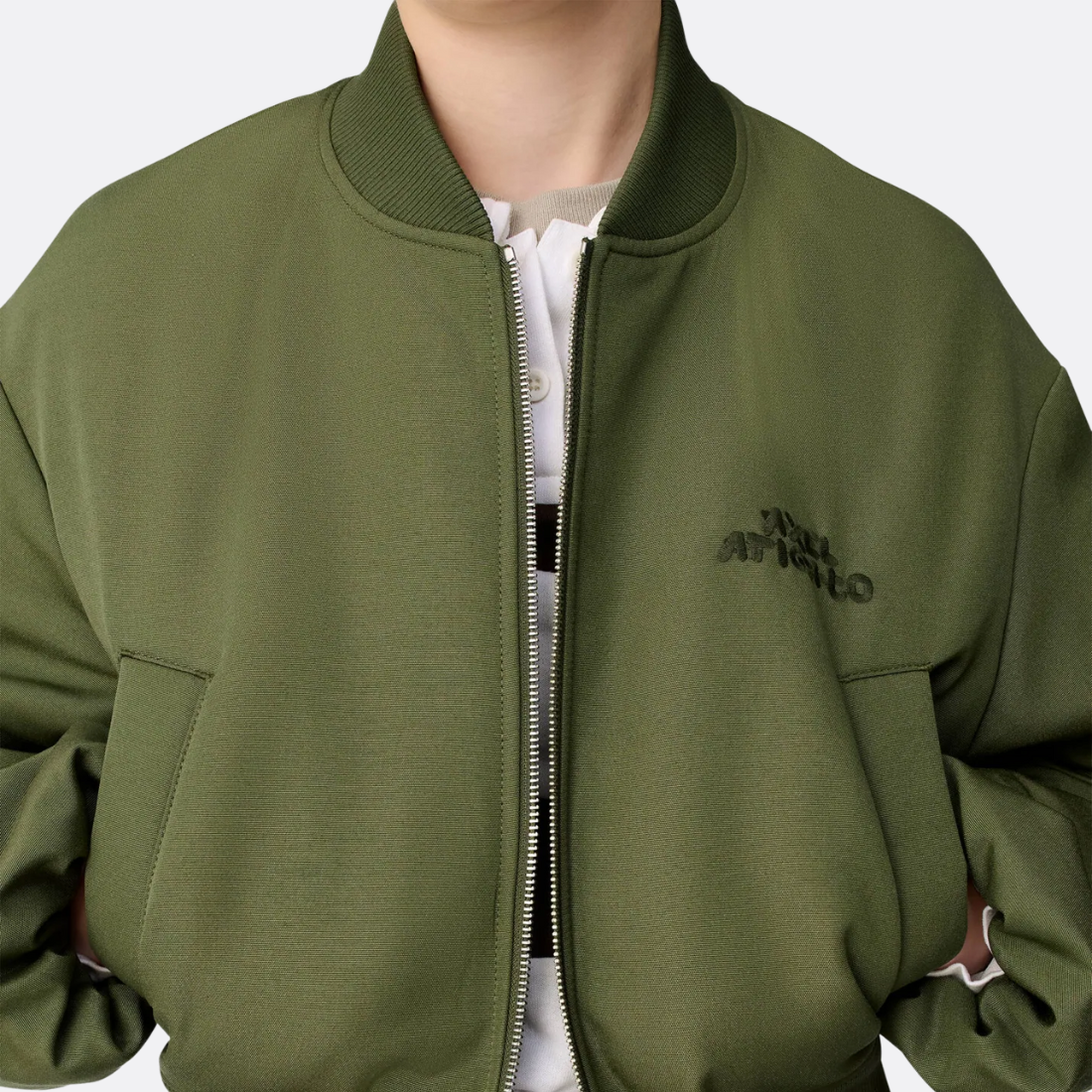 <PRODUCTTITLE> in Green by Axel Arigato.