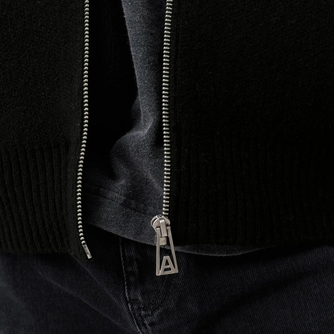 <PRODUCTTITLE> in Black by Axel Arigato.