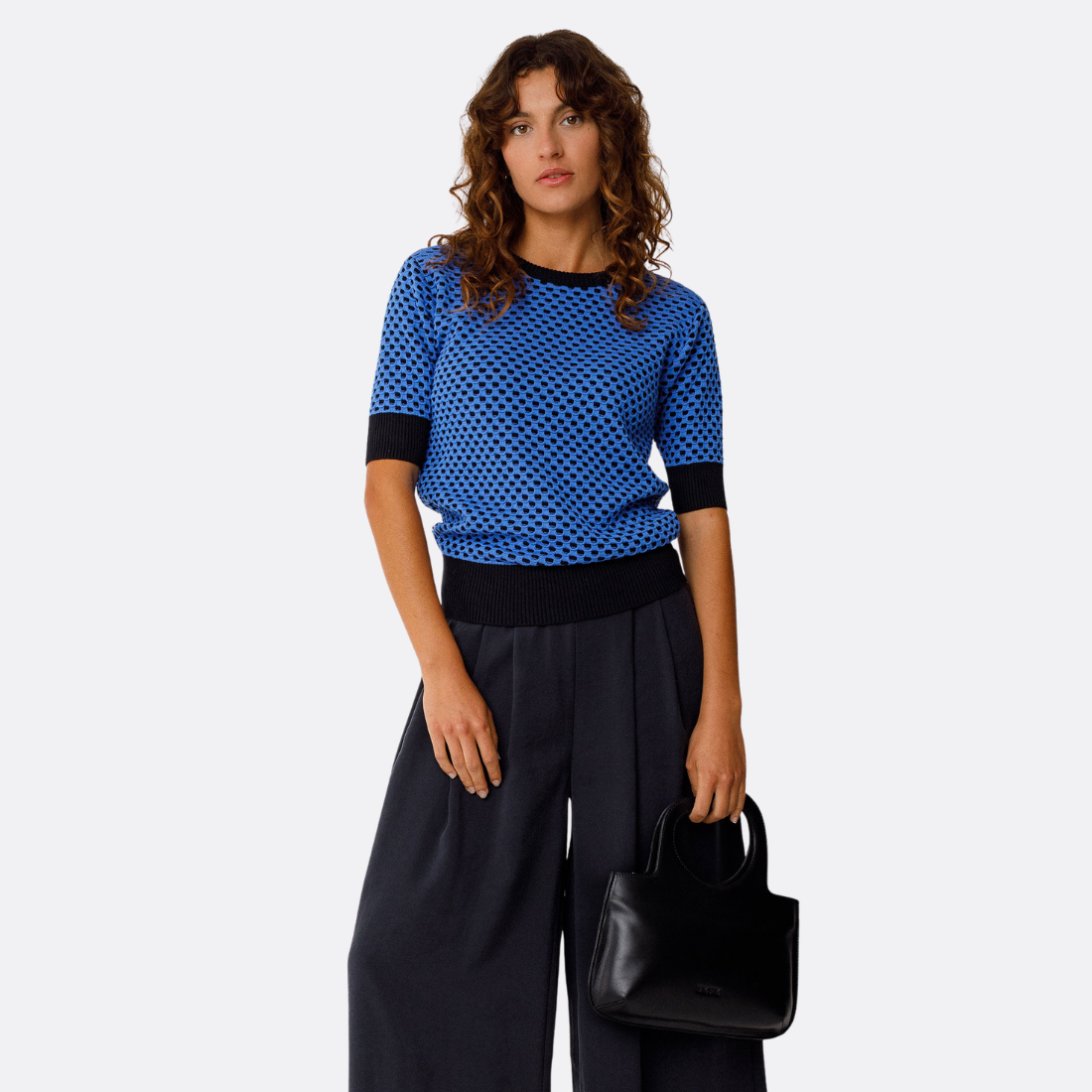 <PRODUCTTITLE> in Black by SKFK.