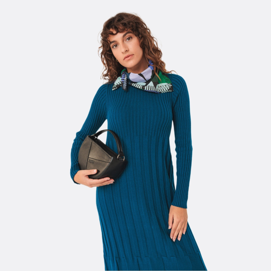 <PRODUCTTITLE> in Black by SKFK.