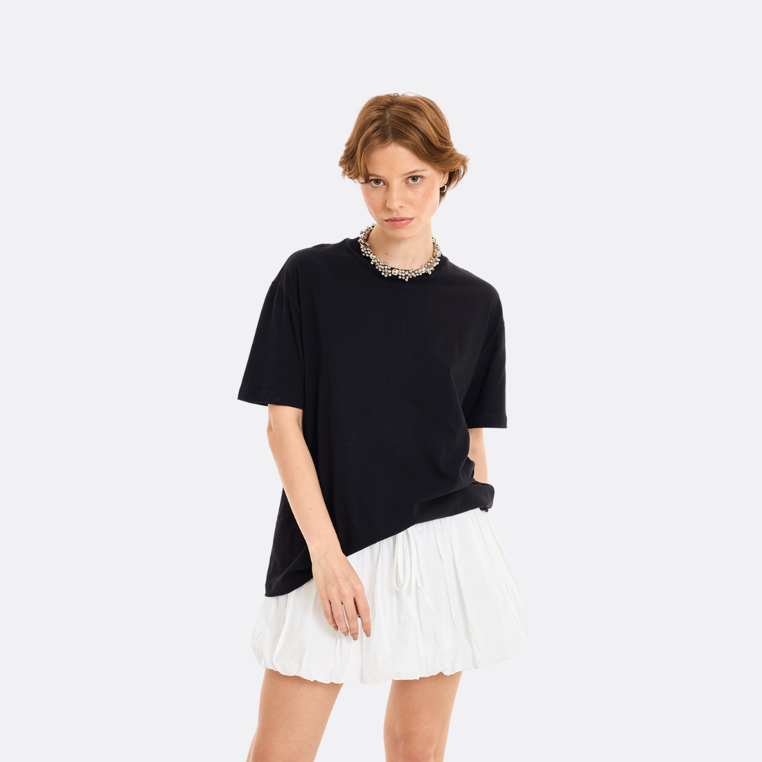 <PRODUCTTITLE> in Black by Loja 3.