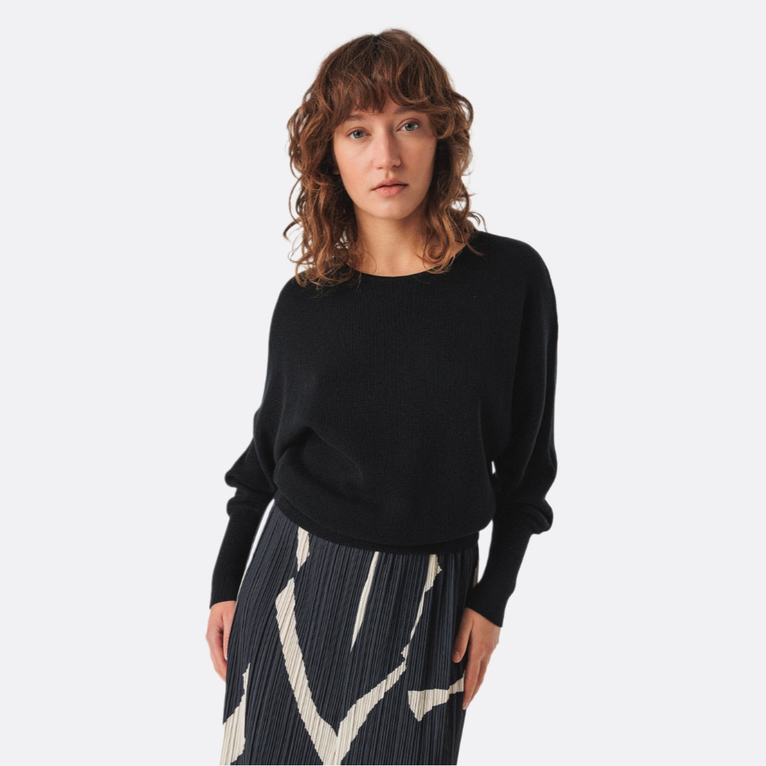 <PRODUCTTITLE> in Black by SKFK.