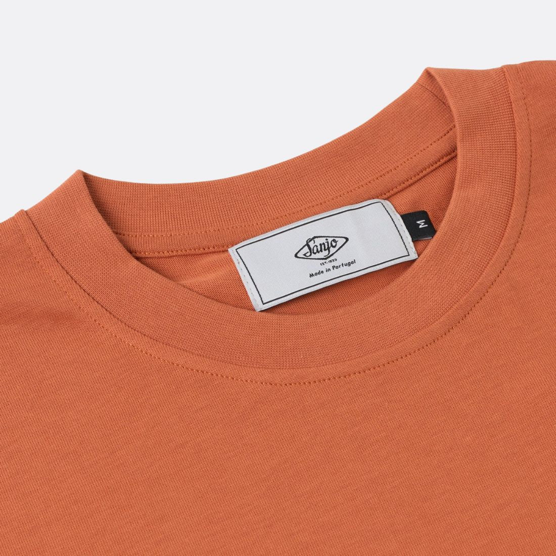 <PRODUCTTITLE> in Orange by Sanjo .
