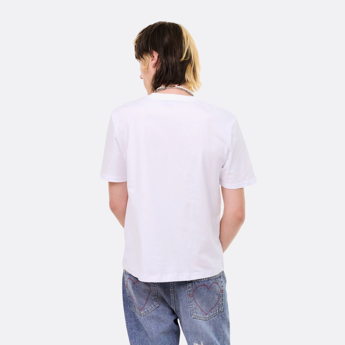 <PRODUCTTITLE> in White by Carne Bollente.