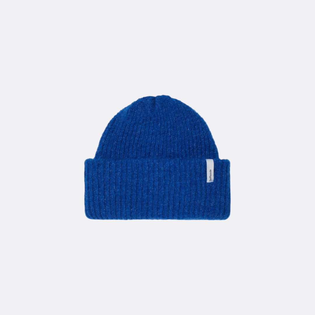 <PRODUCTTITLE> in Blue by Selfhood.