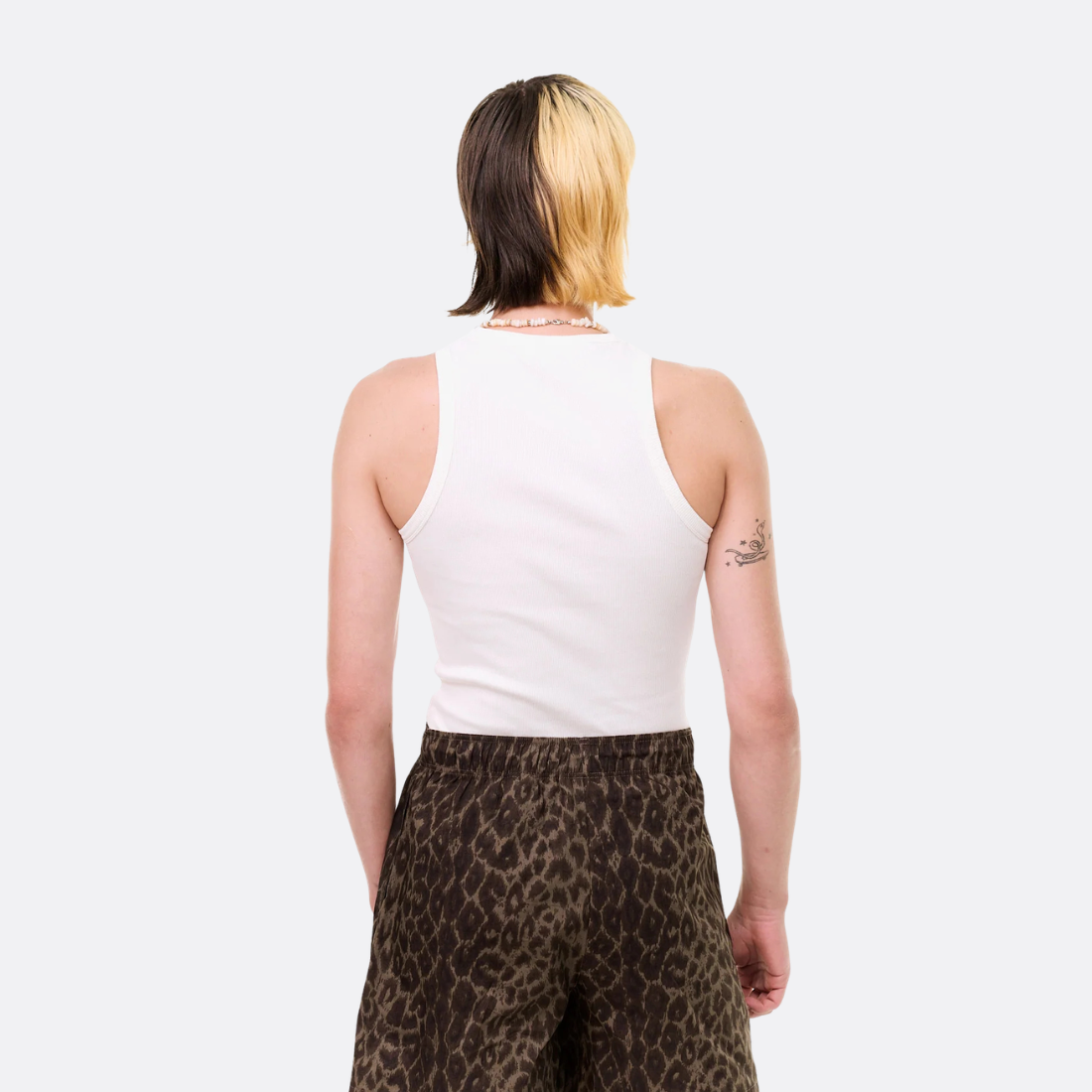 <PRODUCTTITLE> in White by Carne Bollente.