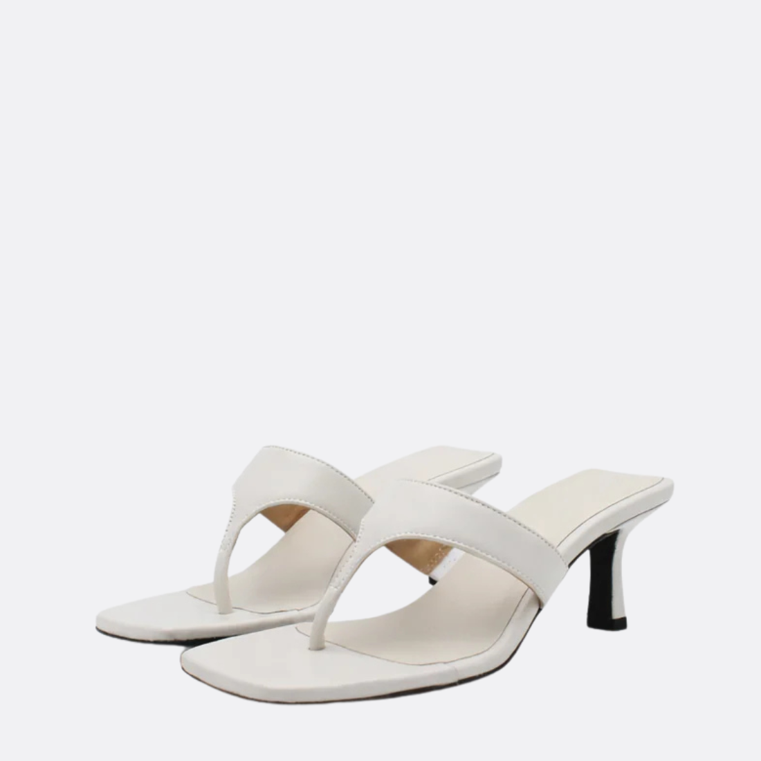 <PRODUCTTITLE> in White by JJ Heitor.