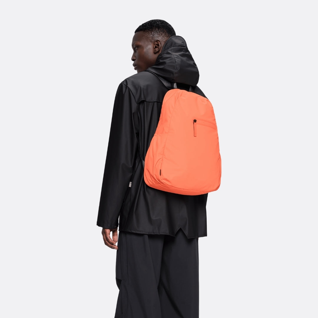 <PRODUCTTITLE> in Orange by Rains.