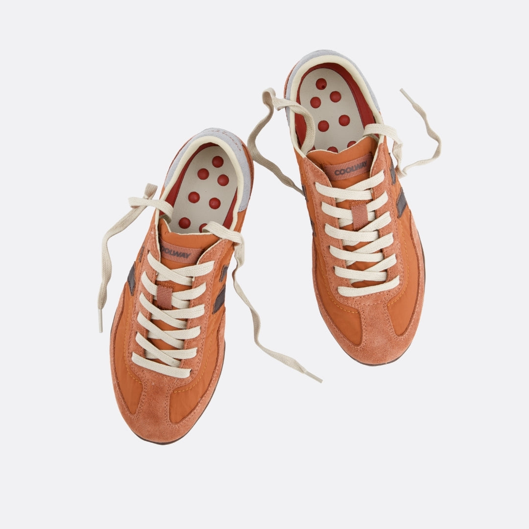 <PRODUCTTITLE> in Orange by Coolway.