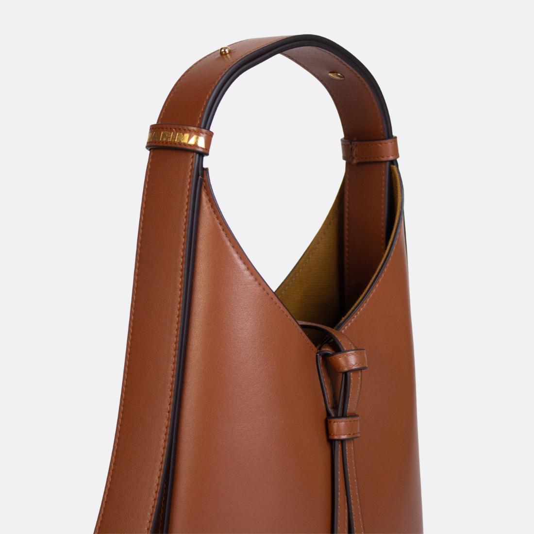 <PRODUCTTITLE> in Brown by Marìna Brand.