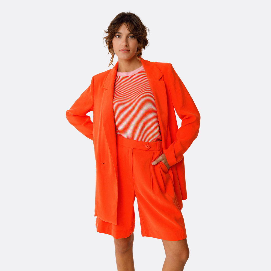 <PRODUCTTITLE> in Orange by SKFK.