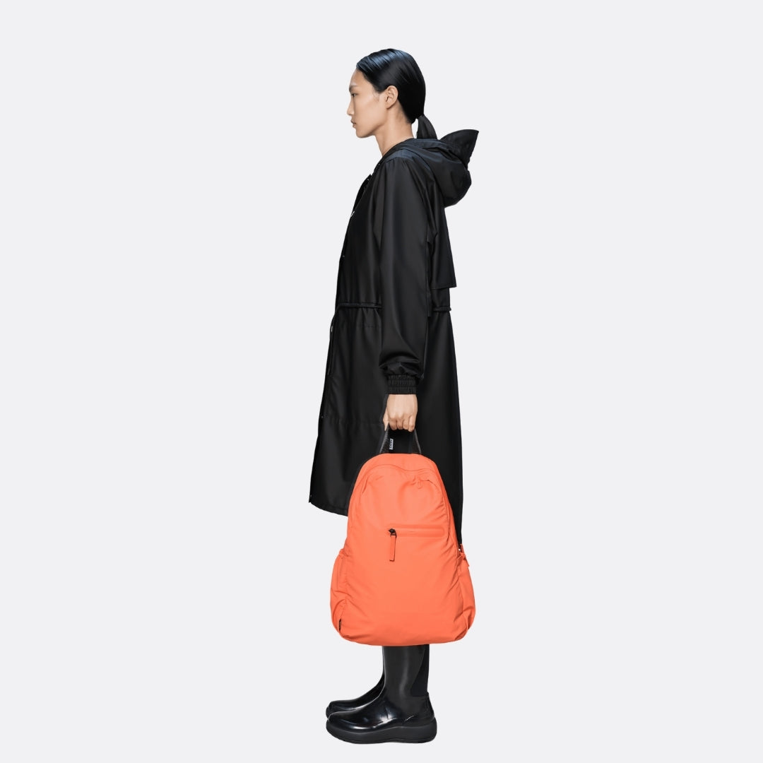 <PRODUCTTITLE> in Orange by Rains.