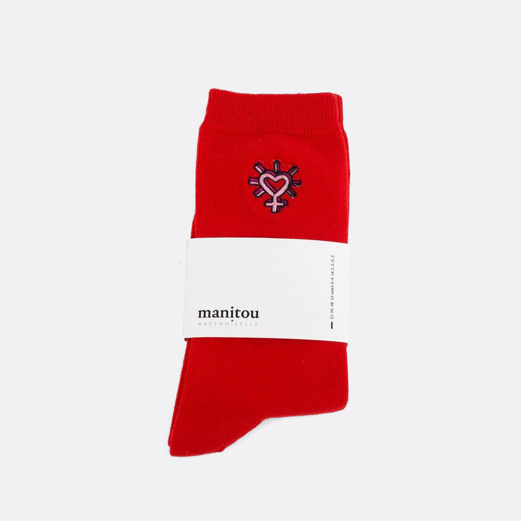 Red soft socks with heart embroidery.