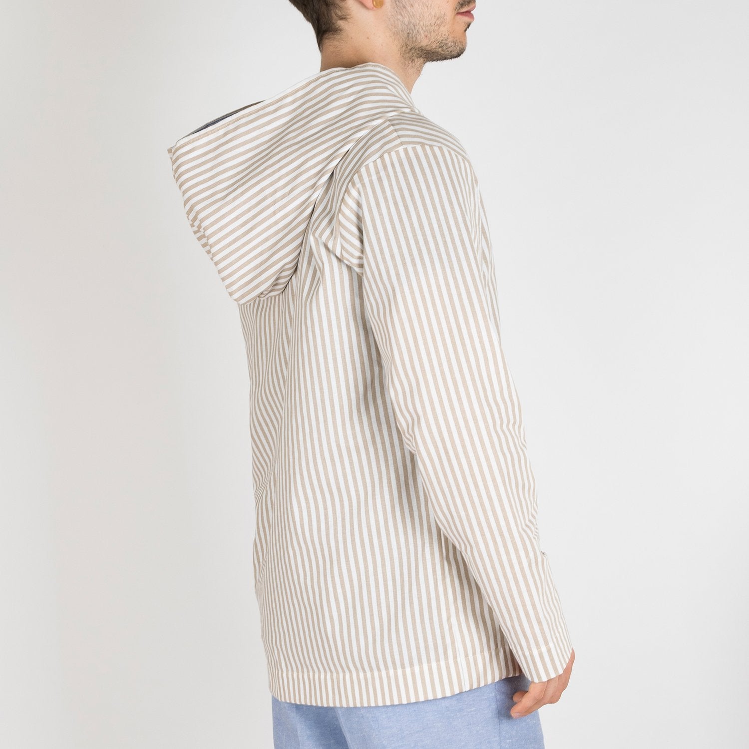 Light camel and white striped hoodie jacket.