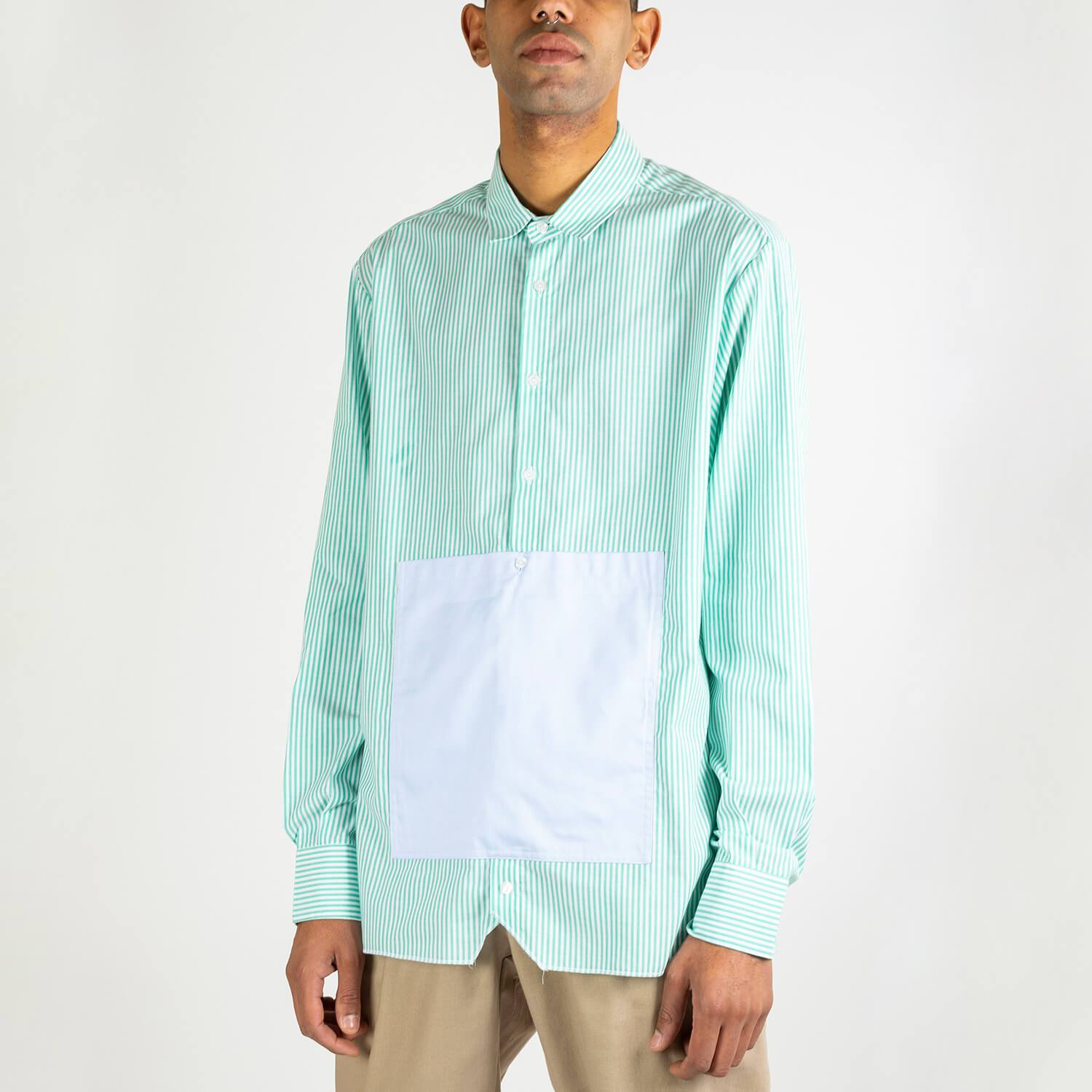 Green and white striped oversized shirt with a light blue kangaroo pocket.