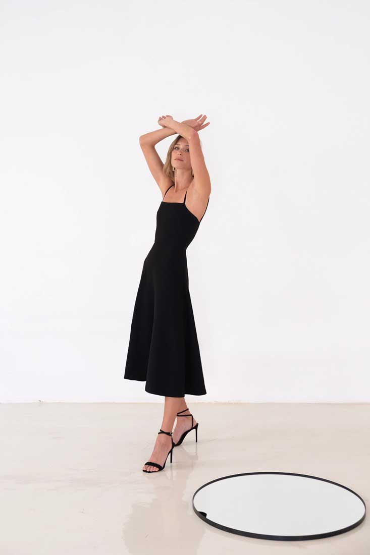 <PRODUCTTITLE> in Black by Alma Capsule.